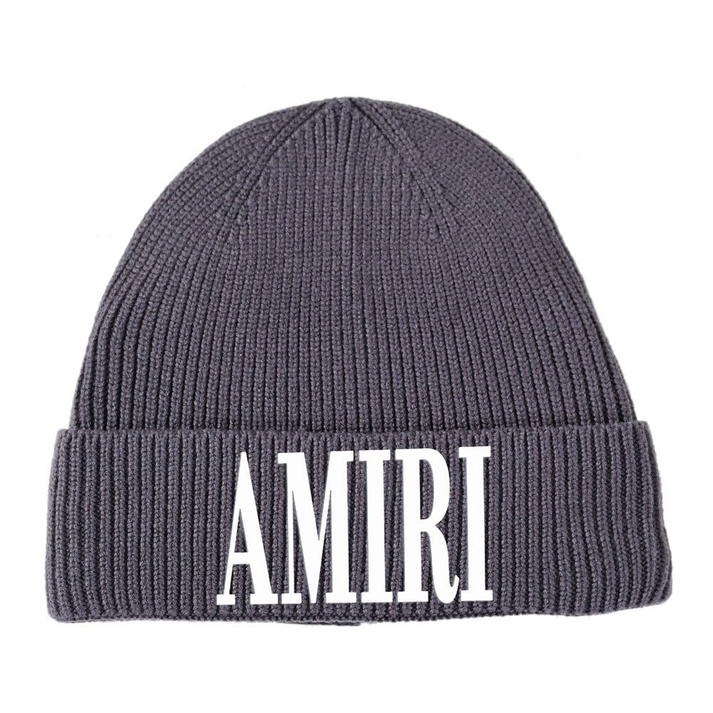 NEW-AMIRI STENCIL TRUCKER HAT
